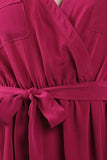 A-line wrap dress with chest pockets and a waist tie