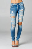 Distressed It Up Skinny Jeans