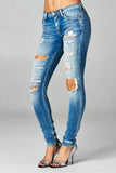Distressed It Up Skinny Jeans